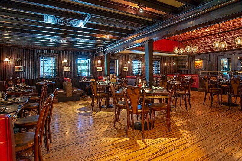 Main dining room with multiple set tables